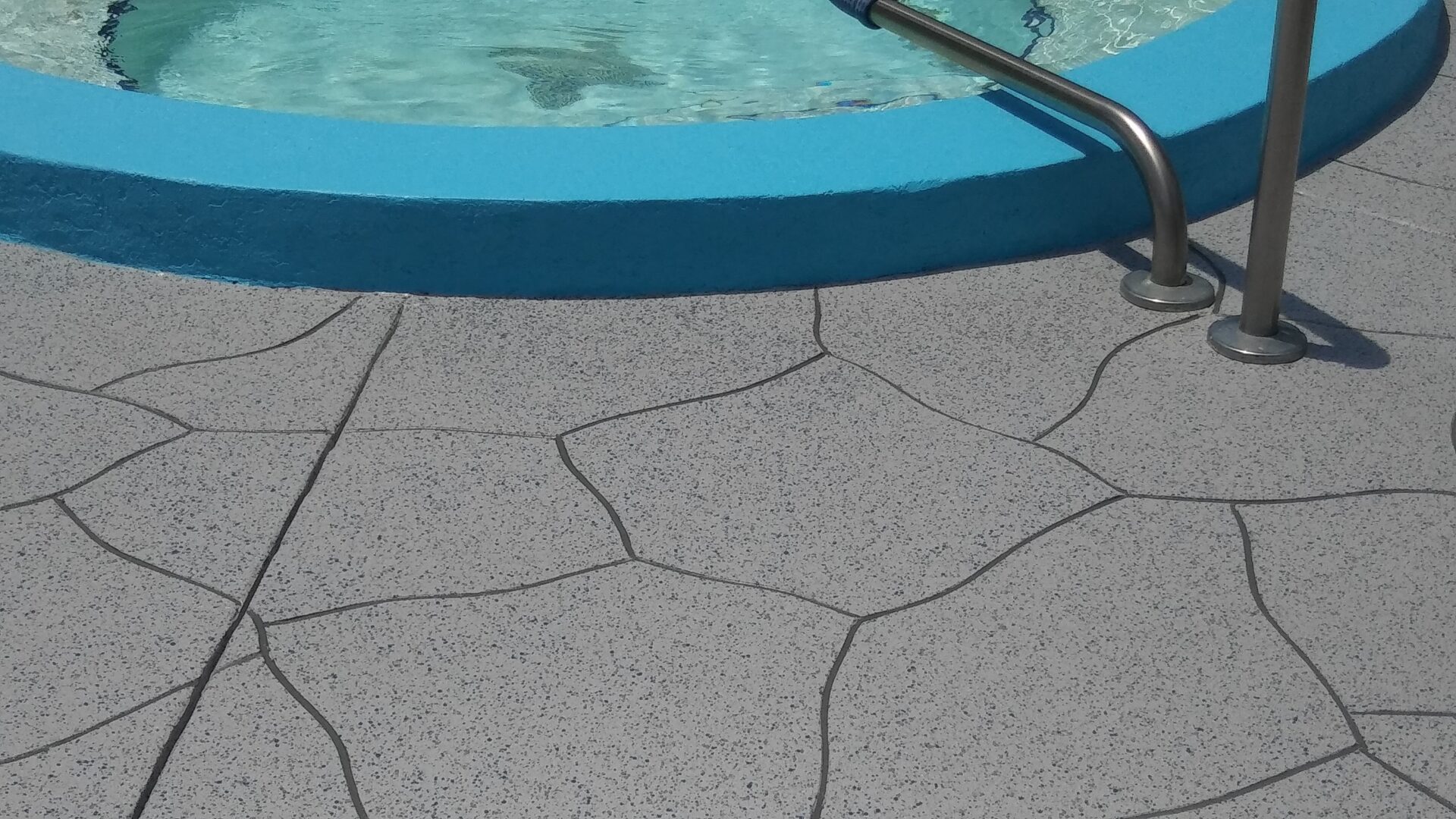 resurfaced concrete around pool