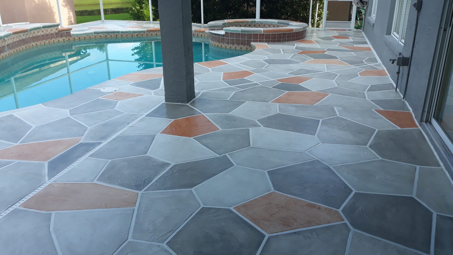 gray and orange stimulated stone pool deck