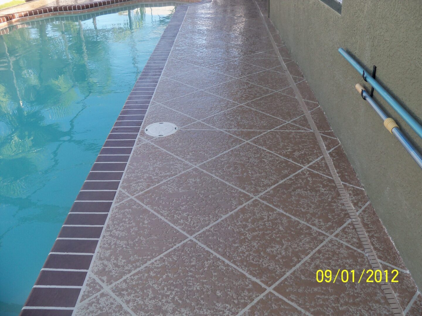 resurfaced pool deck with knock down texture