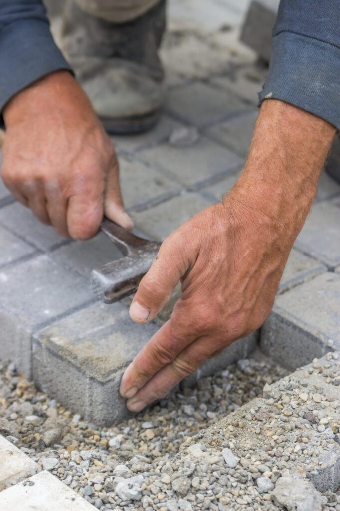 laying brick pavers