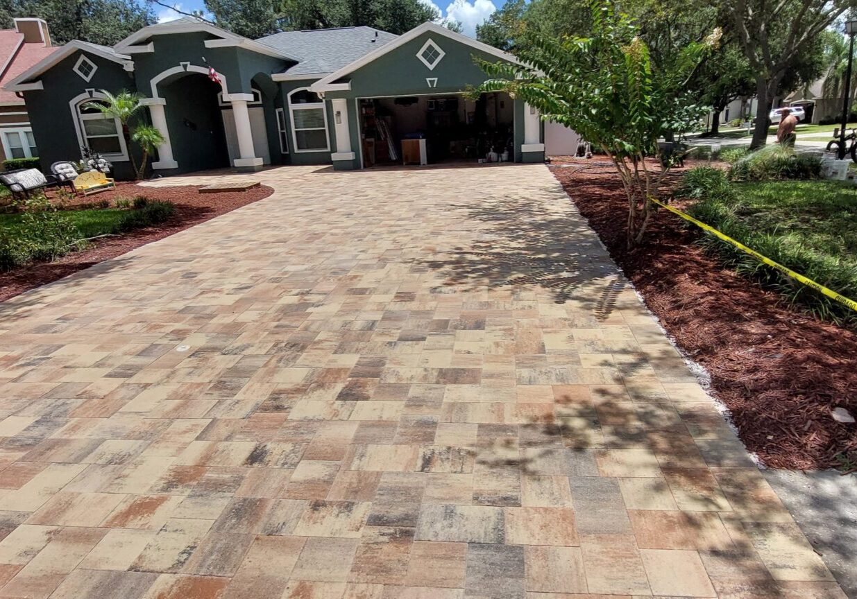 Tan brick paver driveway in Tampa, FL